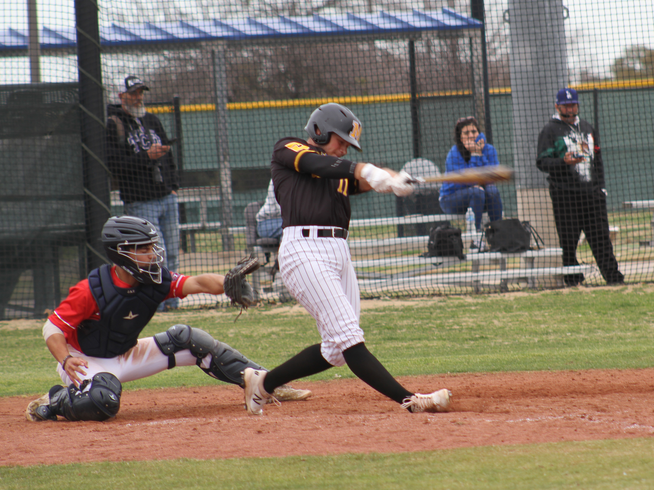 Baseball Wins First DAC Game in Doubleheader Split